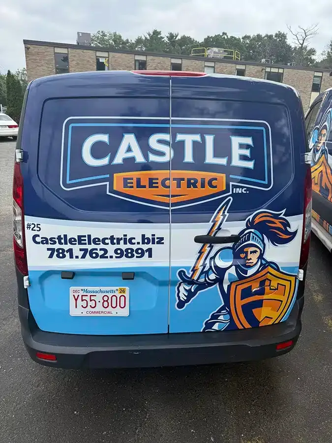 Rear of Castle Electric Inc. service van showing logo and phone number for Norwood MA electrical contractor