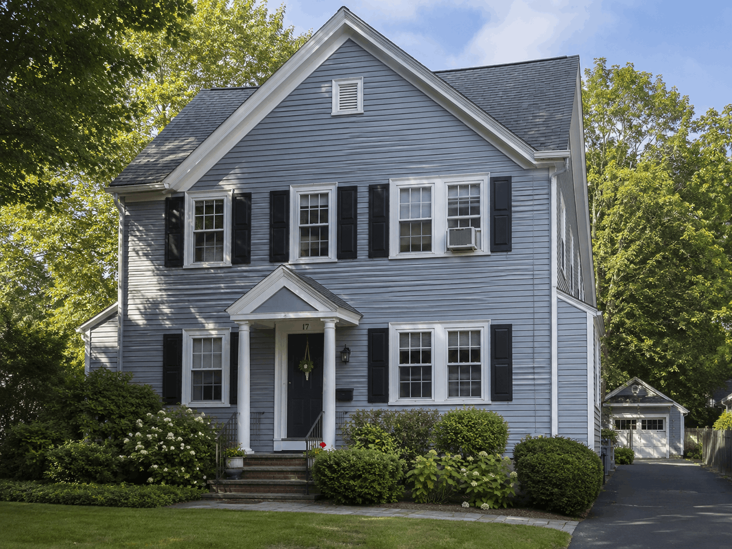 newton home with window AC unit upstairs