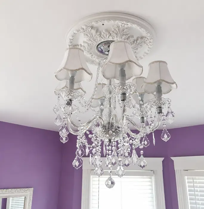Ornate crystal chandelier with ceiling medallion installed by Castle Electric in a Newton MA home