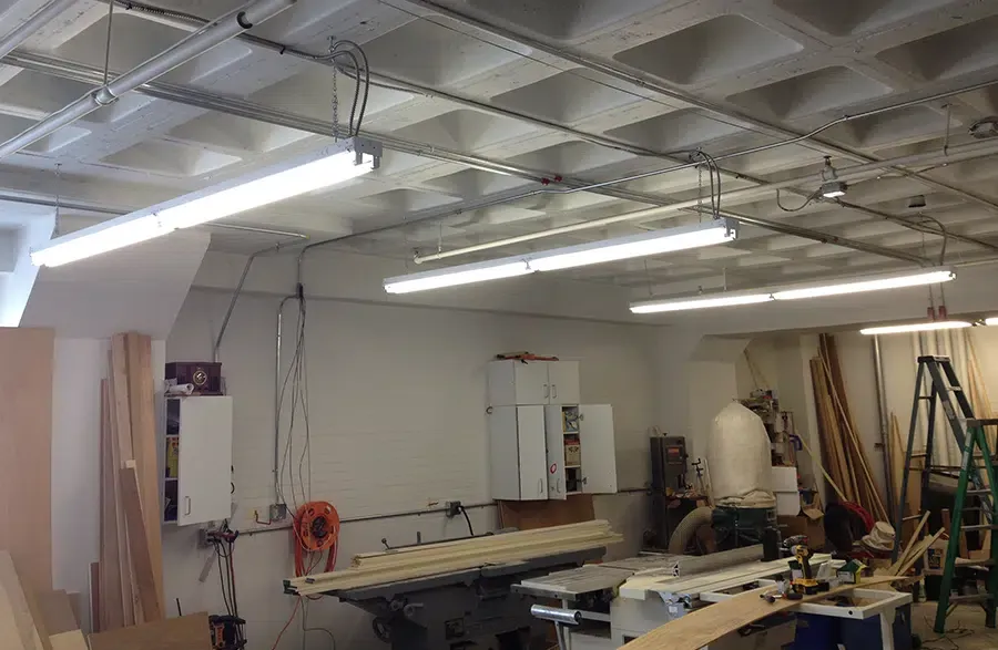 Fluorescent lighting installed in a Norwood MA workshop by licensed Massachusetts electrician