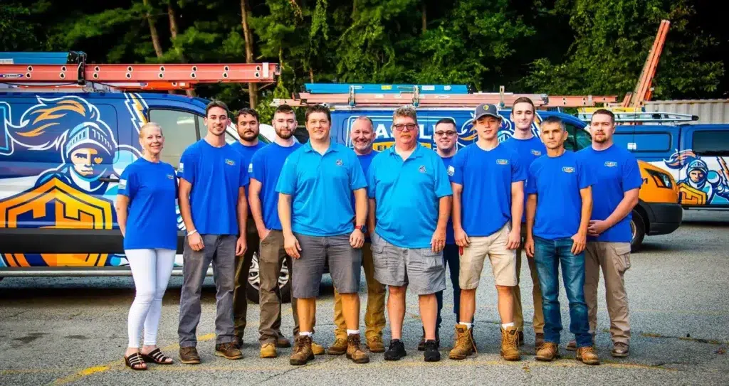 Castle Electric team in front of service vehicle fleet serving Eastern Massachusetts and Greater Boston