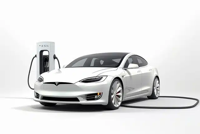 tesla connected to EV charging station